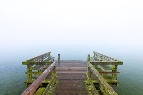 Wooden jetty at Lake Ratzeburg, Ratzeburger See in the mist, Lauenburg Lakes Nature Park, Naturpark