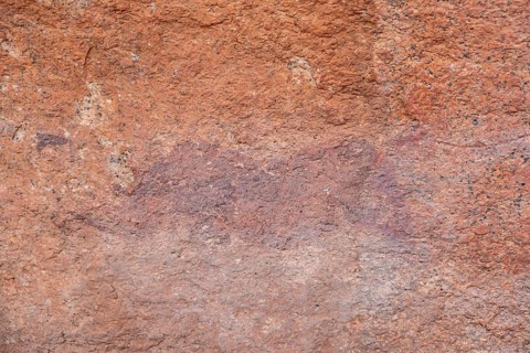 Prehistoric rock art on a red rock wall, Spitzkoppe, Namibia