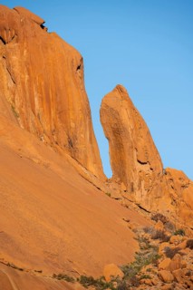 Tall orange rock formations rise majestically, Spitzkoppe, Namibia