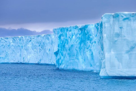 Brasvellbreen glacier from the ice cap Austfonna pouring fresh water into the Barents Sea,