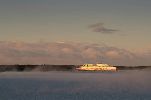 Large Viking Line ferry on calm sea at sunrise, Korpoström, Korpo or Korppo, southwestern