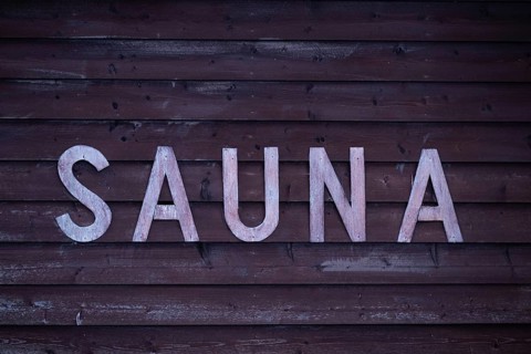 Rustic wooden wall sign with the inscription 'Sauna', Korpoström, Korpo or Korppo, Southwestern