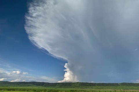 Landscape with approaching rain front (Nimbostratus), southern Carpathian Arc, Romania