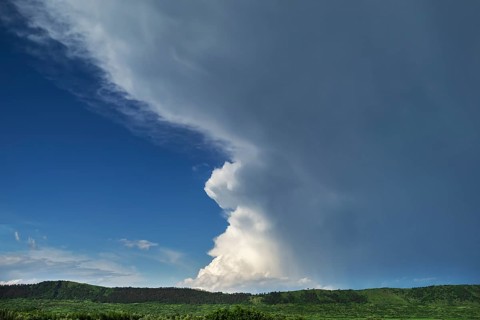 Landscape with approaching rain front (Nimbostratus), southern Carpathian Arc, Romania