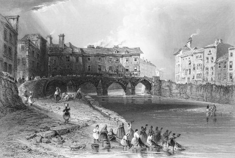 Bridge over the Shannon River in Limerick, woman fishing, Province of Munster, Ireland, city scene,