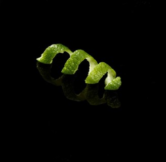 Lime zest against a black background, studio shot