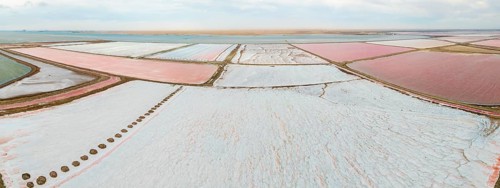 Aerial view of colorful dry pools with salt, saline near Walvis Bay, Namibia
