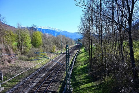 View from a bridge on railroad tracks and the Alps, Oberaudorf, Bavaria, Germany