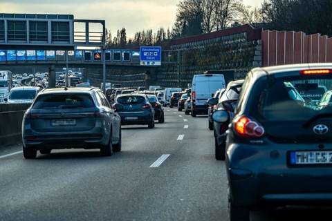 Driving on the A40 motorway, Ruhrschnellweg, in heavy traffic, drivers' perspective, Bochum, North