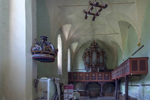 Interior with baroque organ of the abandoned 16th century Protestant fortified church, Tobsdorf,