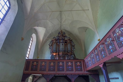 Gallery with baroque organ of the abandoned 16th century Protestant fortified church, Tobsdorf,