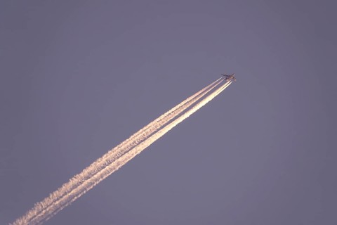 Airplane with contrails, Germany