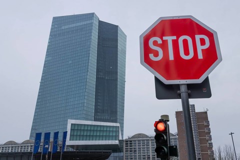 A STOP sign and a red traffic light in front of the European Central Bank (ECB) in Frankfurt am