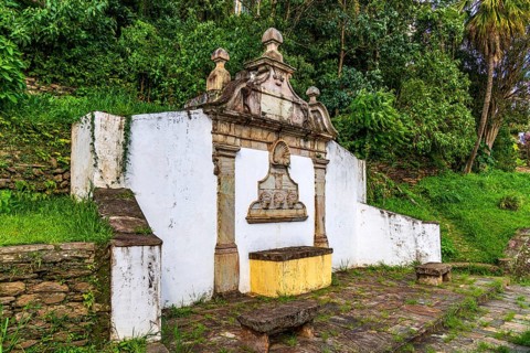 Baroque stone fountain from the 18th century. Built in 1753 in the city of Ouro Preto, Minas Gerais