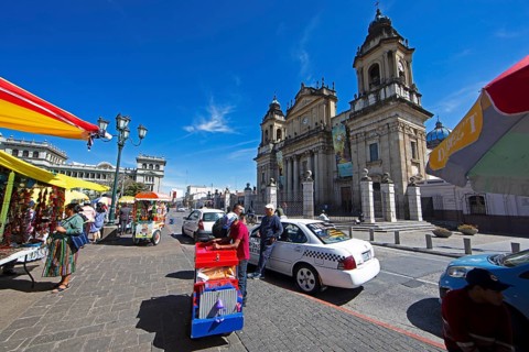 Street scene in the old town zone 1, in the back the cathedral or Catedral Metropolitana de