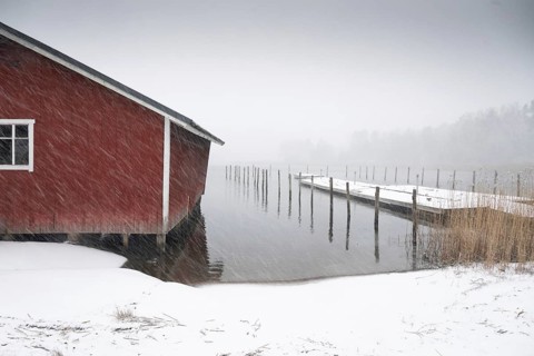 Boathouse and jetty, fresh snowfall, blowing snow, corpo or corppo, southwestern archipelago,