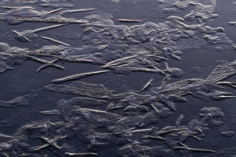 Crystal-like ice structures, frozen lake, Finland