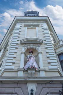 Mannequin in Ukrainian traditional costume in a niche at a 19th-century house, Czernowicz, Ukraine