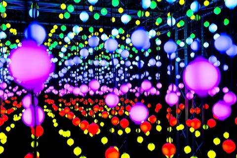 Light, glowing balls, LED lamps, hang in series, side by side, on top of each other, change their