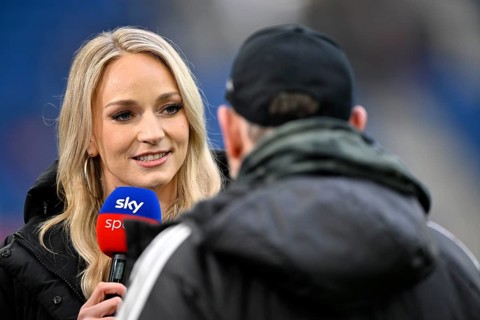 SKY presenter reporter Katharina Kleinfeldt, portrait in interview microphone micro logo with