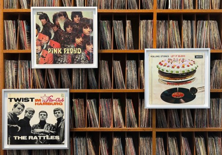 Records by Pink Floyd, the Rattels and the Rolling Stones with more records on the shelf, former