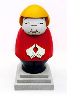An avenger figure from the Ore Mountains depicts former federal chancellor Angela Merkel in black