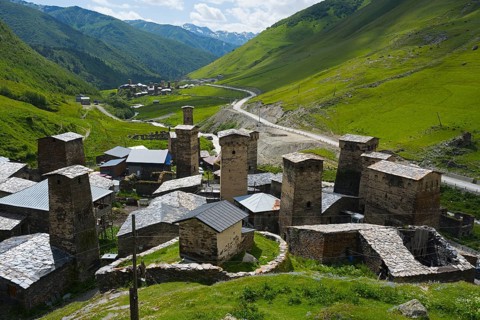 Historic village with many towers, located in a green mountain valley, defensive towers, Ushguli,