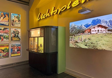 Cinema from the 1950s as a presentation with movie posters, box offices and original films, House