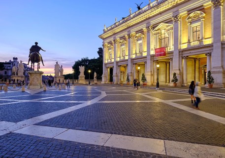 Equestrian statue of Marcus Aurelius and illuminated Palazzo Nuovo at the blue hour, Piazza del