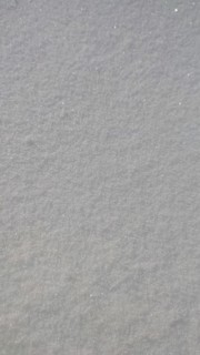Close-up view of sparkling fresh snow covering a smooth surface, Franconian Forest
