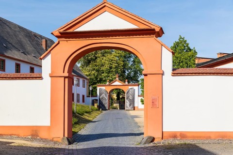 View through 2 gates at the entrance to St. Marienthal Abbey on the Neisse, Ostritz, Saxony,