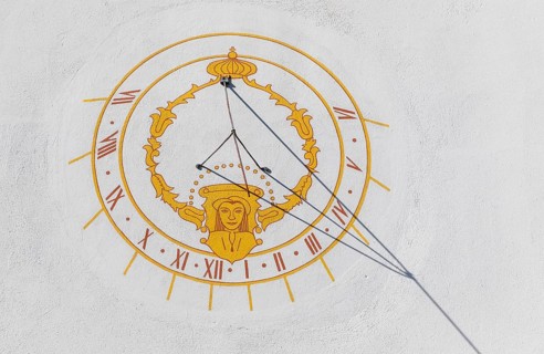 Sundial on a façade in St. Marienthal Abbey on the Neisse, Ostritz, Saxony, Germany