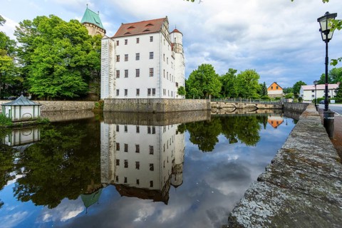 Renaissance Schönfeld Castle with reflection in water, Dresden, Saxony, Germany