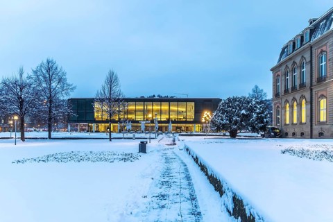 Exterior view of the state parliament building, the New Palace on the right. Winter in Stuttgart.