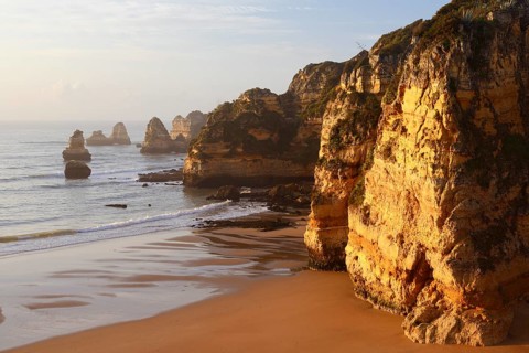 Rocky coast and beach, Praia Dona Ana, Lagos, Algarve, Portugal