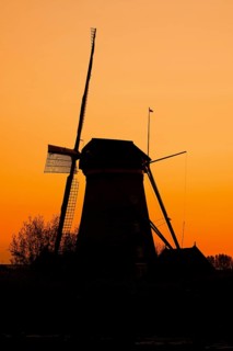 Historic windmill at sunset, UNESCO World Heritage Site, Kinderdijk, South Holland, Netherlands