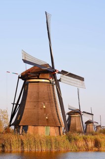 Historic windmills in the evening light, UNESCO World Heritage Site, Kinderdijk, South Holland,