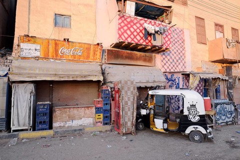 Shops and tuk-tuk, Esna, Egypt