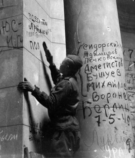 Inscription, graffiti, a Red Army man writes his name on the wall at the Reichstag, early May 1945,