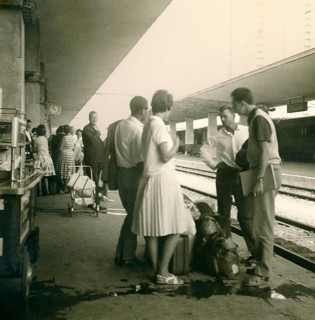 Historical photo summer 1961, tourists in front of returning home at Rimini train station, Rimini,