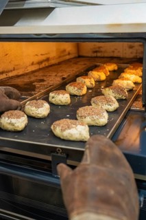 Rolls with linseeds on a sheet in the oven are baked, rolls are baked, Haselstaller Hof, Gechingen,