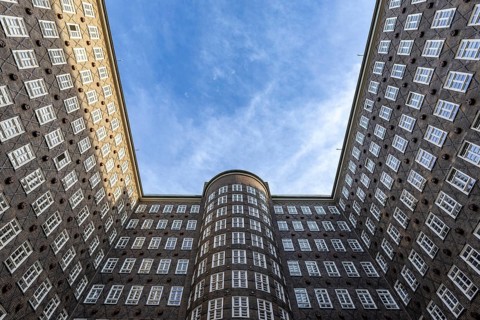 View of the sky in the courtyard of the Chilehaus in the Kontorhausviertel, Hamburg, Germany