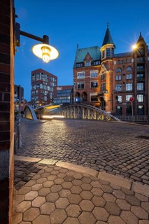 Road traffic in Speicherstadt at blue hour, Hamburg, Germany
