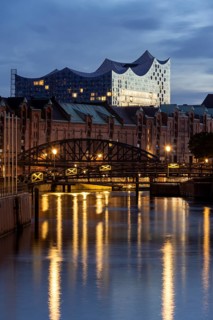View from Speicherstadt to the Elbe Philharmonic Hall at the blue hour, Hamburg, Germany