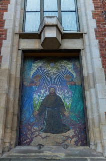 Mosaic of a saint on a church, Krakow, Poland