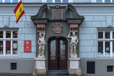 Historic entrance portal with two elecampane, Krakow, Poland