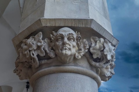 Reliefs on the pillars of the arcades of the Cloth Hall, Main Market Square, Krakow, Poland