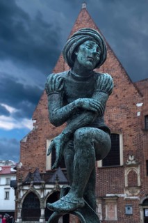 Fountain by Jan Budzillo, figure of a student, copy of a figure from the Marian Altar, Main Market