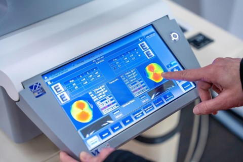 Close-up of touchscreen medical device being operated, optician, Pforzheim