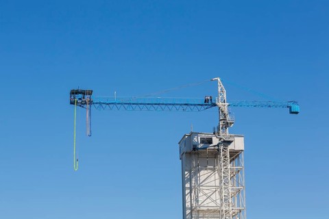 Montreal Bungee Tower with dangling long yellow elastic bungee jumping cord, Old Port of Montreal,